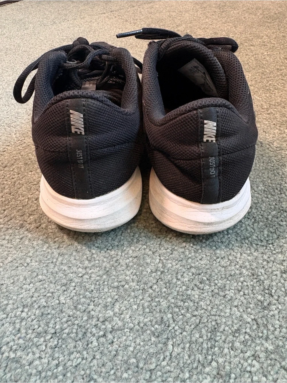 Nike Black Mesh Athletic Sneakers with White Swoosh